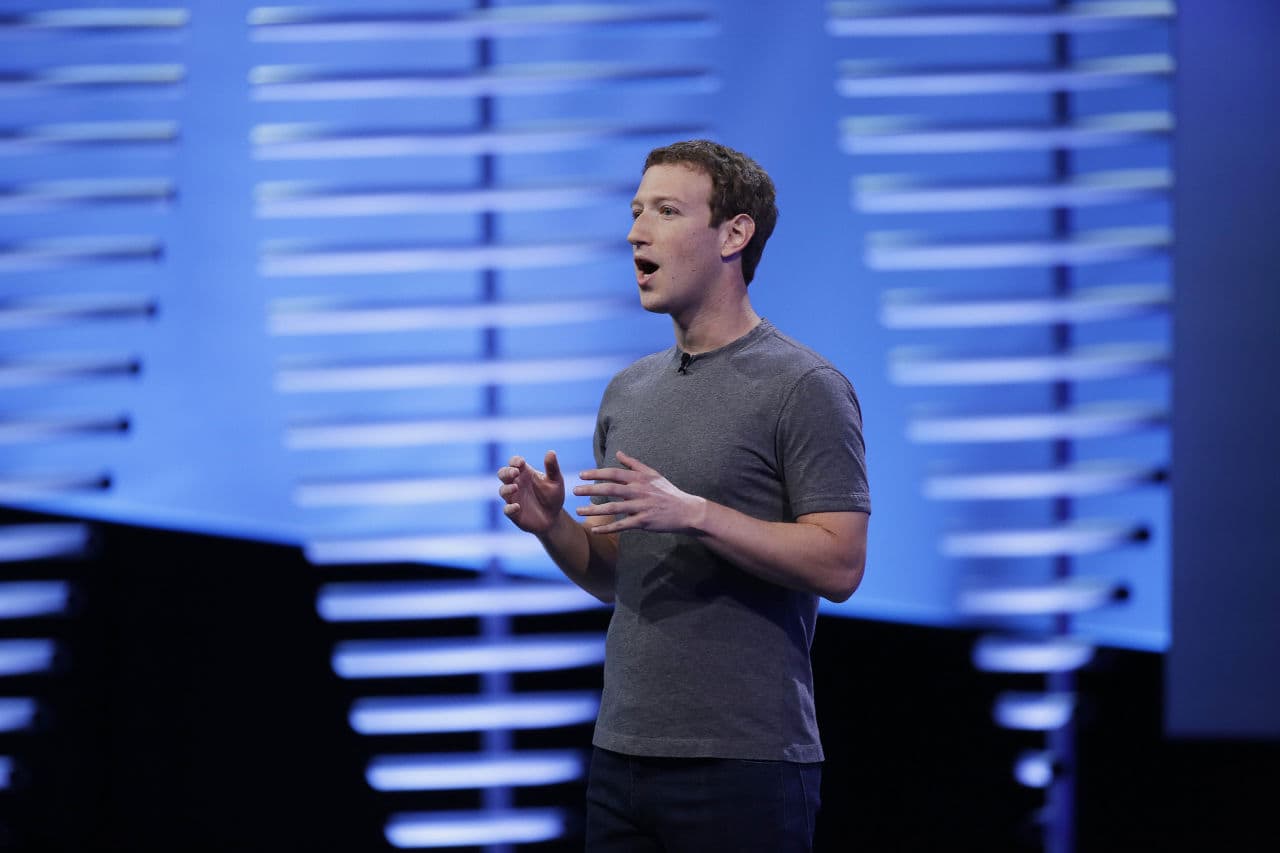 Facebook CEO Mark Zuckerberg during the keynote address at the F8 Facebook Developer Conference Tuesday, April 12, 2016, in San Francisco. Zuckerberg's low-key wardrobe is not uncommon in the corner office suites of Silicon Valley. (AP Photo/Eric Risberg)
