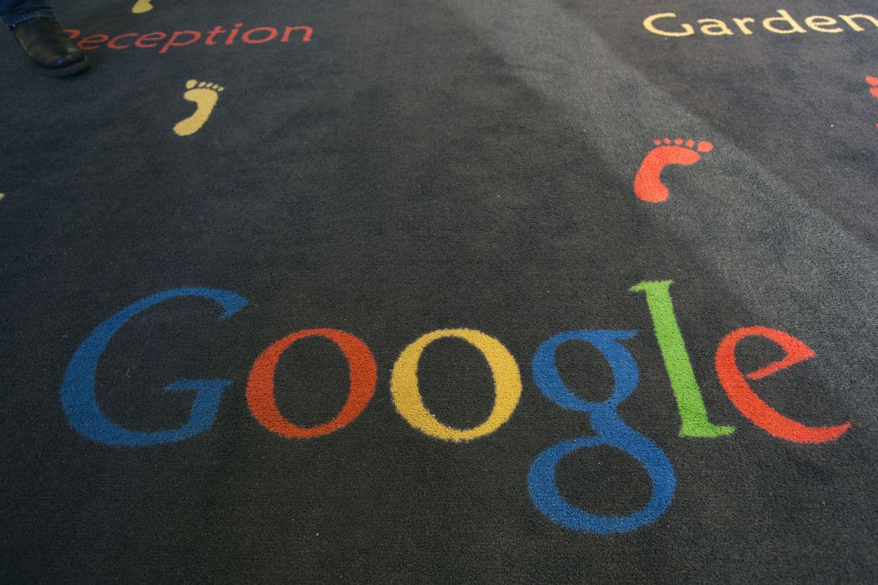 This Dec. 10, 2013 file photo shows the Google logo printed on a carpet during the inauguration of the new Google cultural institute in Paris, France. (Jacques Brinon/AP)