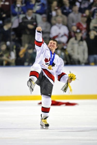 Theo Fleury celebrates after a gold medal win with Canada in the 2002 Olympics. (Brian Bahr/Getty Images)