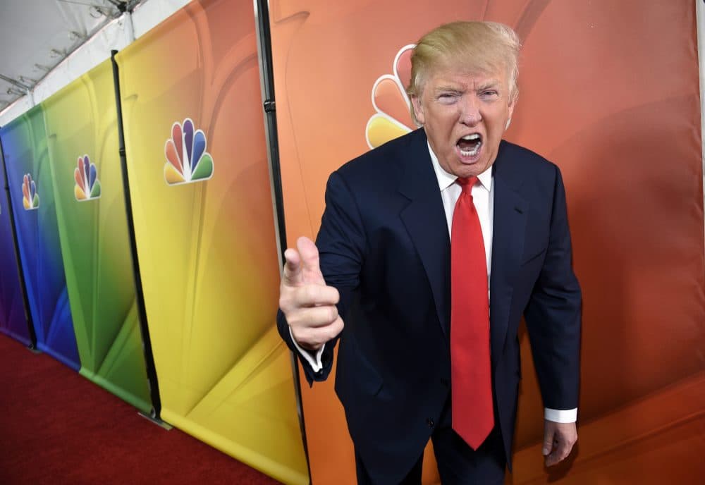 Joanna Weiss: Donald Trump's tenuous relationship with the political press is based on a misunderstanding. In this photo, the entertainer turned presidential candidate mugs for photographers at the NBC 2015 Press Tour at The Langham Huntington Hotel on Friday, Jan. 16, 2015, in Pasadena, Calif. (Chris Pizzello/AP)