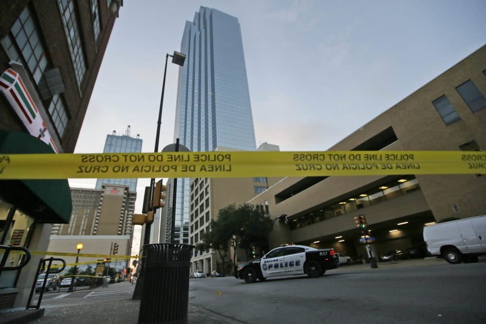 Police tape marks off the area where a shooting took place in downtown Dallas on Friday morning. (LM Otero/AP)