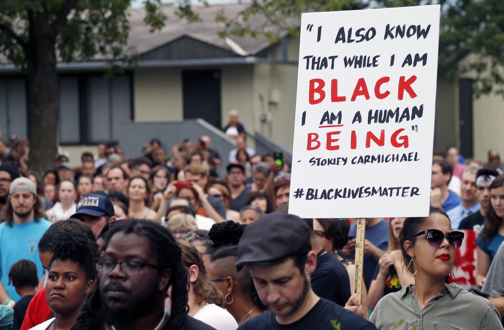 Hundreds gather at the JJ Hill Montesorri School on Thursday in St. Paul, Minn. for a vigil following the shooting death by police of Philando Castile Wednesday night in Falcon Heights, Minn. after a traffic stop by St. Anthony police. (Jim Mone/AP)