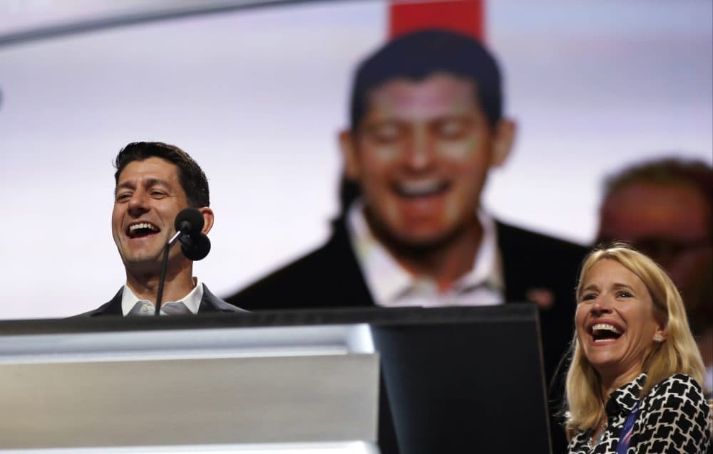 Speaker of the House Paul Ryan, joined by his wife Janna Ryan, checks out the stage inside Quicken Loans Arena during preparation for the RNC Sunday. (Carolyn Kaster/AP)