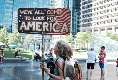 Protesters Brave Heat Wave As Democrats Convene To Nominate Clinton