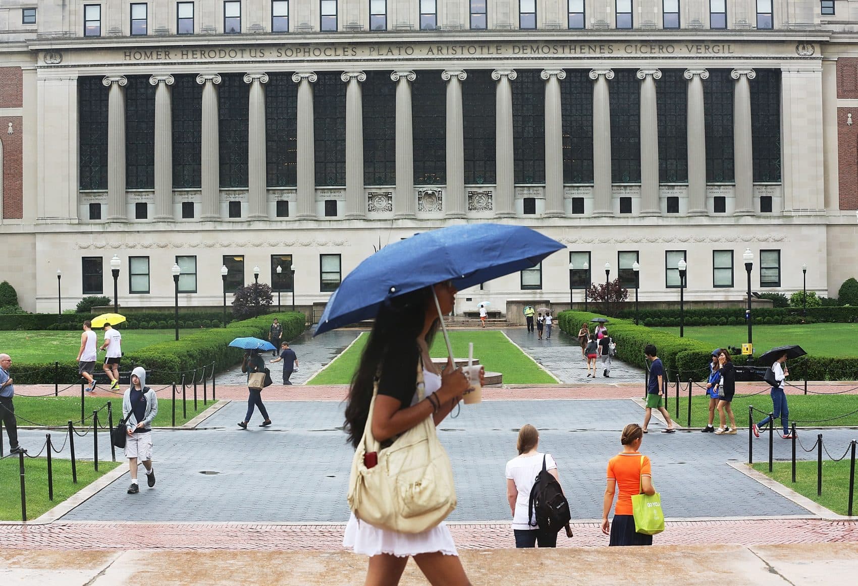 People walk on the Columbia University campus on July 1, 2013 in New York City. An interest rate hike kicks in today for student loans, an increase for 7 million students. Congress left town at the end of last week failing to prevent rates on new Stafford student loans increasing from 3.4 percent to 6.8 percent. (Mario Tama/Getty Images)