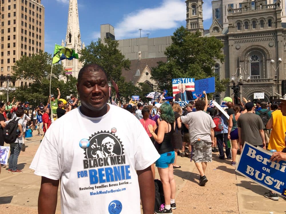 Bruce Carter, founder of Black Men for Bernie, says he's here in Philadelphia to promote a political revolution. (Shannon Dooling/WBUR)