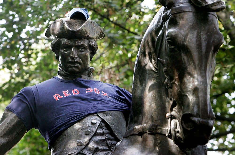 The statue of Paul Revere sported a Red Sox cap and jersey in Boston's North End neighborhood on Sunday, Oct. 17, 2004, when the Boston pro baseball team was down 3-0 against the New York Yankees in the American League Championship Series. (AP Photo/Michael Dwyer)
