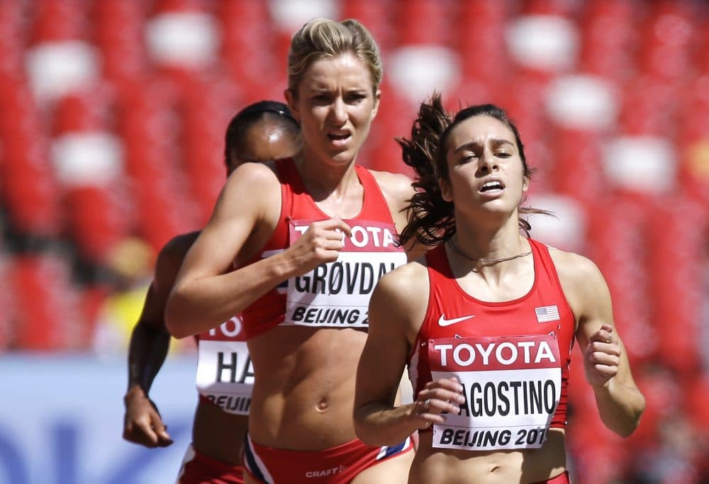 Abbey D'Agostino, right, in a round one heat of the womens 5000m at the World Athletics Championships in Beijing on Aug. 27, 2015. (David J. Phillip/AP)