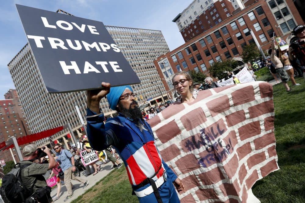 Protestors gather during a rally against Republican presidential candidate Donald Trump on Monday in Cleveland. (Alex Brandon/AP)