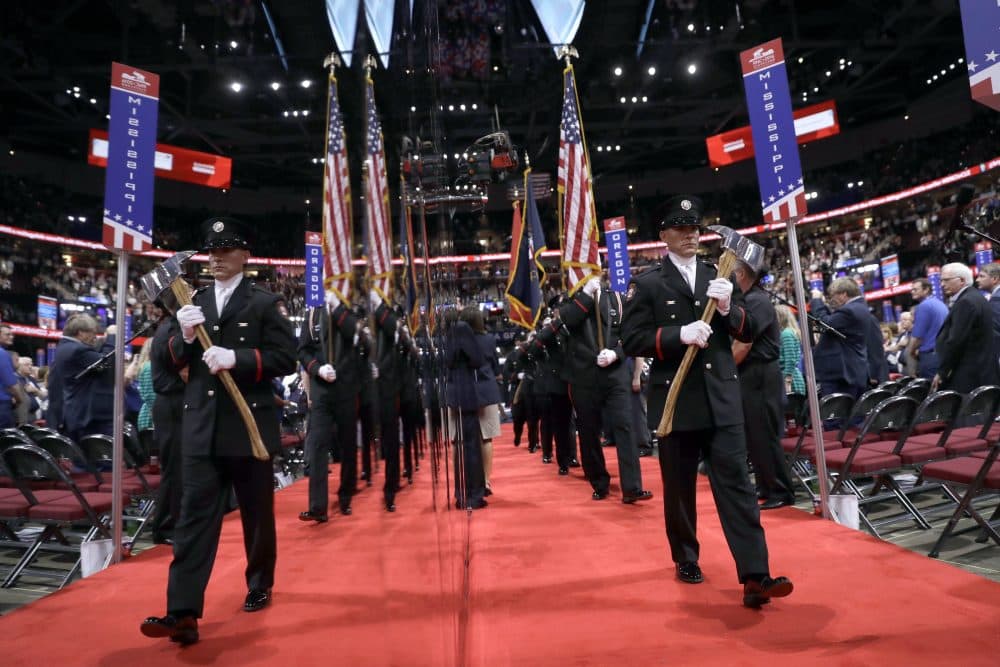 Color Guard carry the colors into the convention floor during first day of the Republican National Convention. (Matt Rourke/AP)