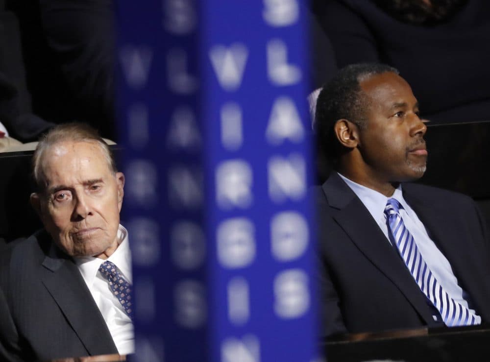 Former Republican presidential candidates Sen. Bob Dole and Dr. Ben Carson attend the opening night of the Republican National Convention. (Paul Sancya/AP)