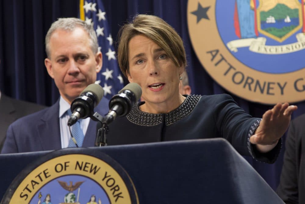 Massachusetts Attorney General Maura Healey, right, joined by New York Attorney General Eric Schneiderman, discusses a lawsuit against Volkswagen on Tuesday in New York. (Mark Lennihan/AP)