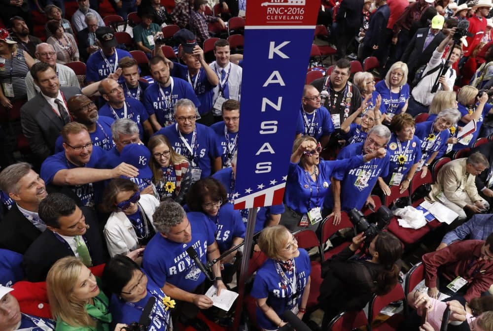 The Kansas delegation is seen on the floor of the convention as a roll call vote is held. (Paul Sancya/AP)