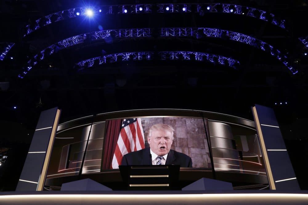 Donald Trump addresses the delegates by video during the second day of the Republican National Convention. (John Locher/AP)