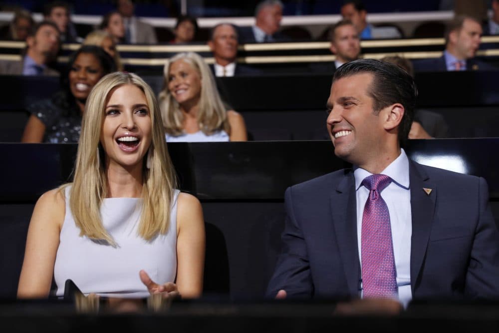 Republican Presidential Candidate Donald Trump's children Ivanka Trump and Donald Trump Jr., laugh as they watch during the second day session of the Republican National Convention in Cleveland, Tuesday, July 19, 2016. (AP Photo/Carolyn Kaster)