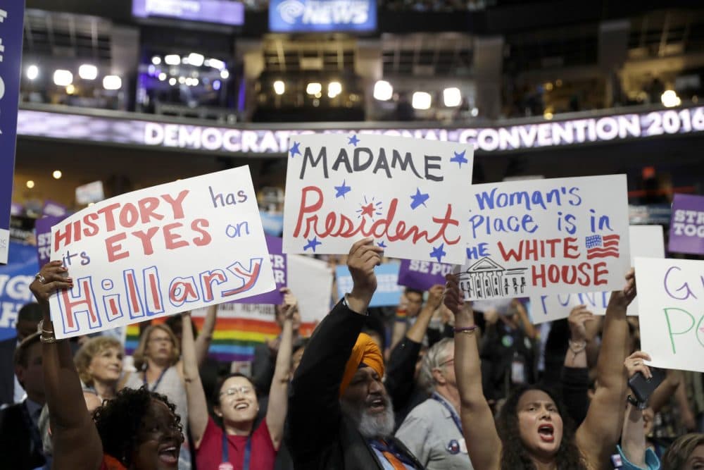 California delegates hold up signs as they cheer during the third day session of the Democratic National Convention. (Matt Rourke/AP)
