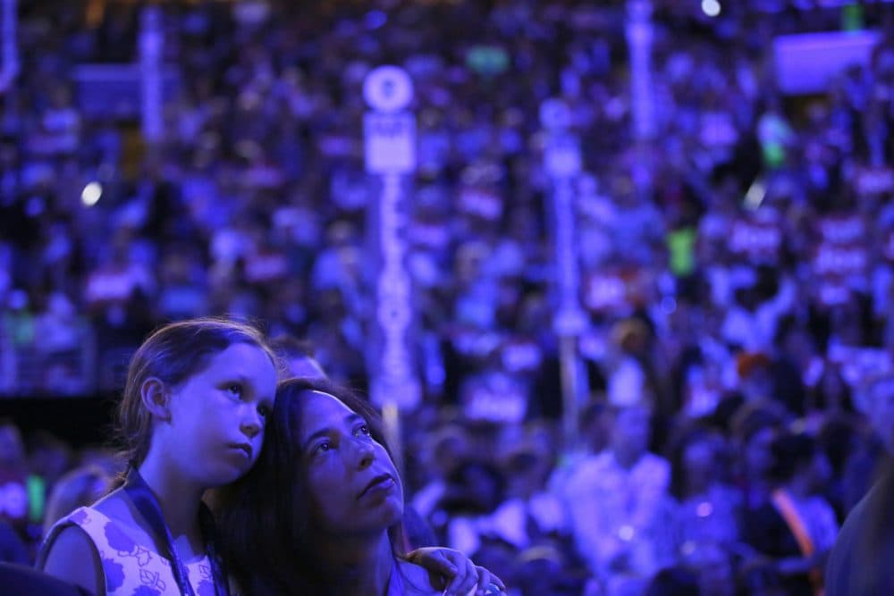 Illinois delegate Valerie Alexander, right, watches with her 9-year-old daughter Maeve Wednesday night. (Matt Rourke/AP)