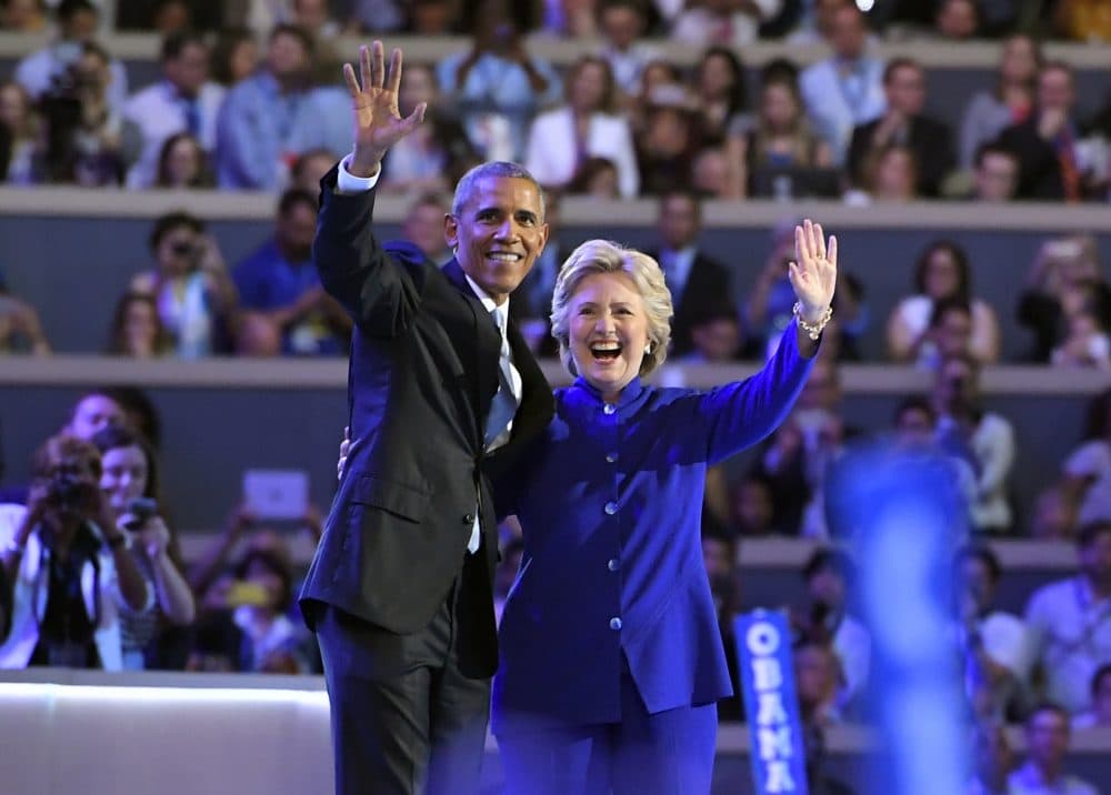 Hillary Clinton appears on stage with President Obama after his speech Wednesday night. (Mark J. Terrill/AP)