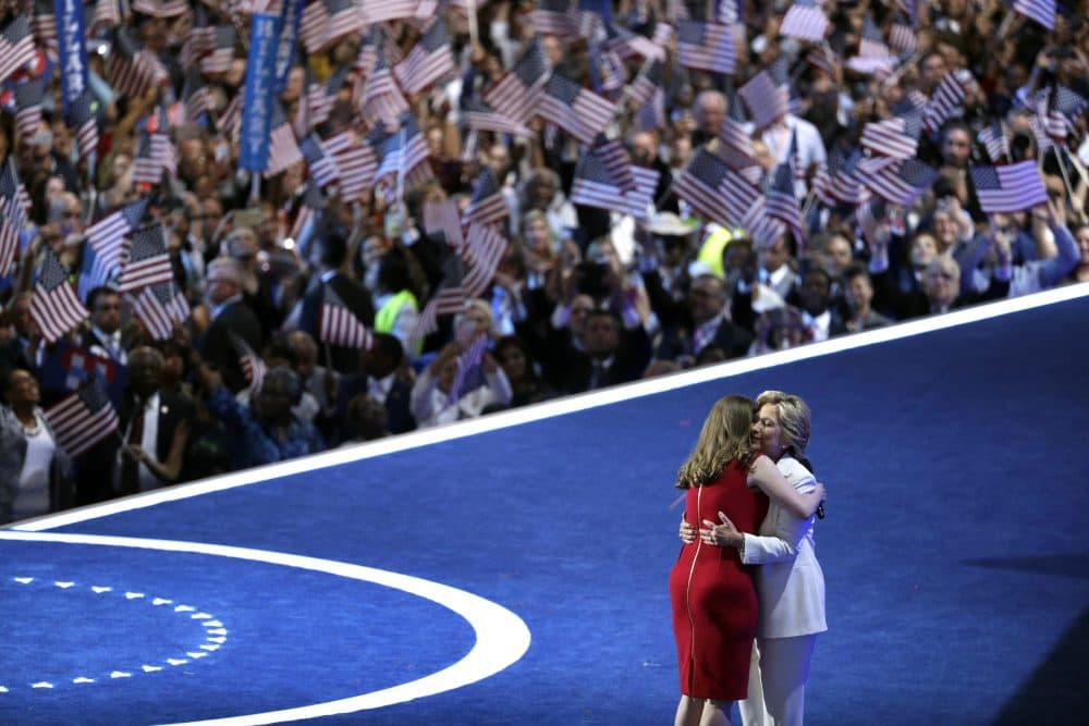 Democratic presidential candidate Hillary Clinton embraces daughter Chelsea Clinton. (John Locher/AP)