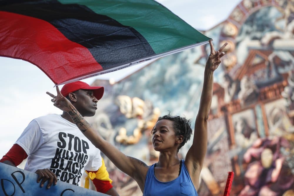 Black Lives Matter protestors march on Tuesday. (John Minchillo/AP)
