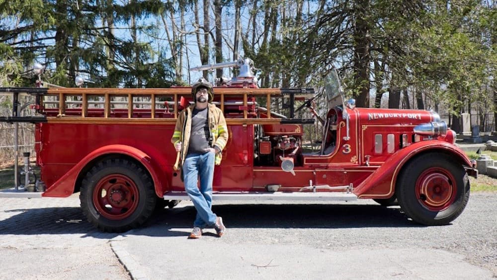 Joe Hill poses with a firetruck for his latest novel, "The Fireman" (Courtesy Jen Salt)
