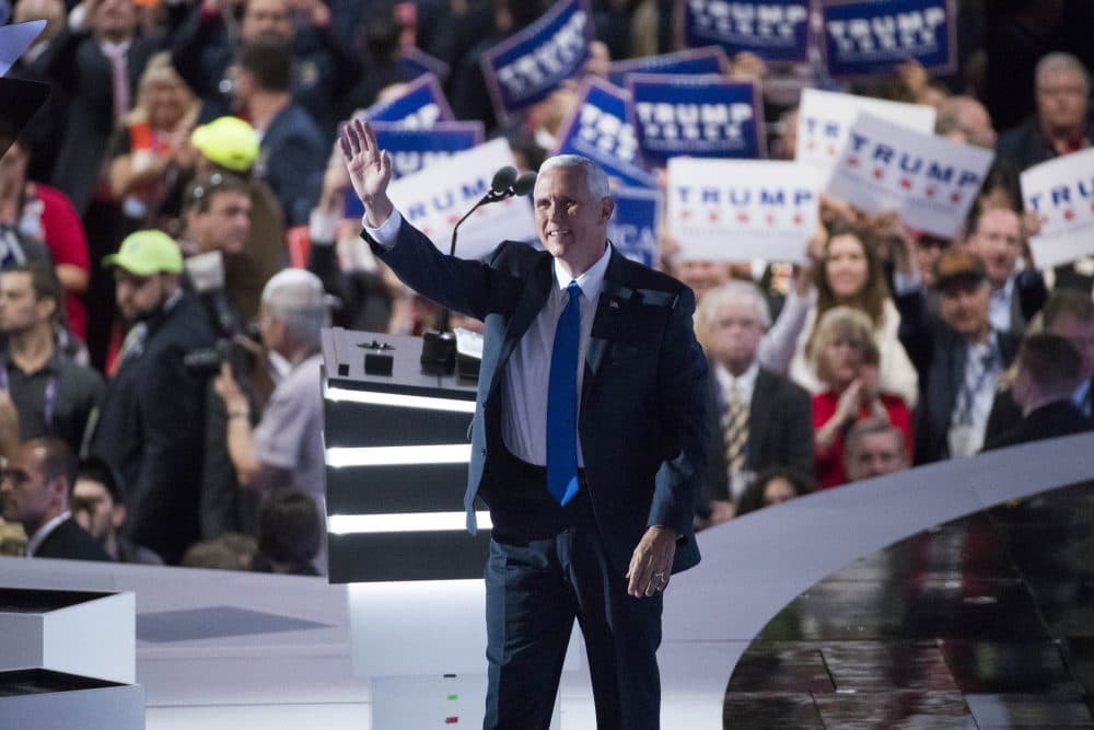 Vice presidential candidate Gov. Mike Pence greets the crowd after being introduced during the Republican National Convention Wednesday night. (Evan Vucci/AP)