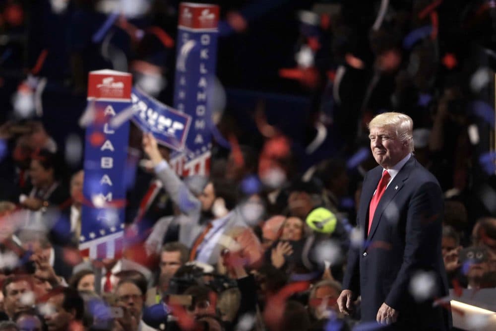 Donald Trump looks into the crowd as confetti and balloons fall following his speech to the Republican National Convention Thursday night in Cleveland. (Matt Rourke/AP)