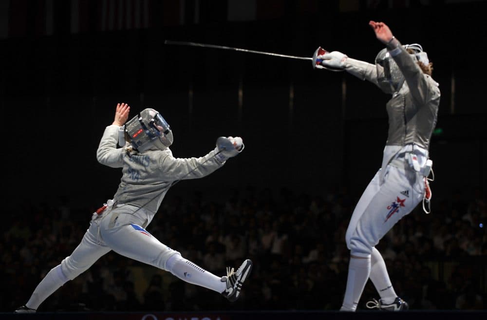 American Sada Jacobson (L) competes against France's Leonore Perrus during the women's team sabre bronze medal match France vs. USA on August 14, 2008 at the Fencing Hall of National Convention center, as part of the 2008 Beijing Olympic Games. (Philippe Desmazes/AFP/Getty Images)