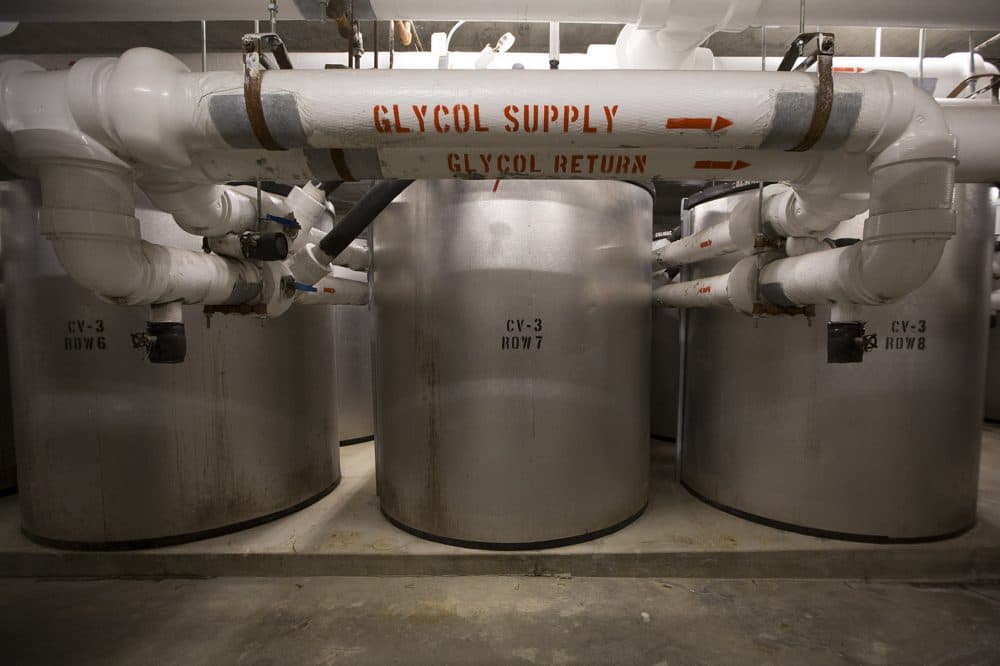 The tanks create energy at night, store it in the form of ice, then use it the next day to offset air conditioning costs. (Jesse Costa/WBUR)