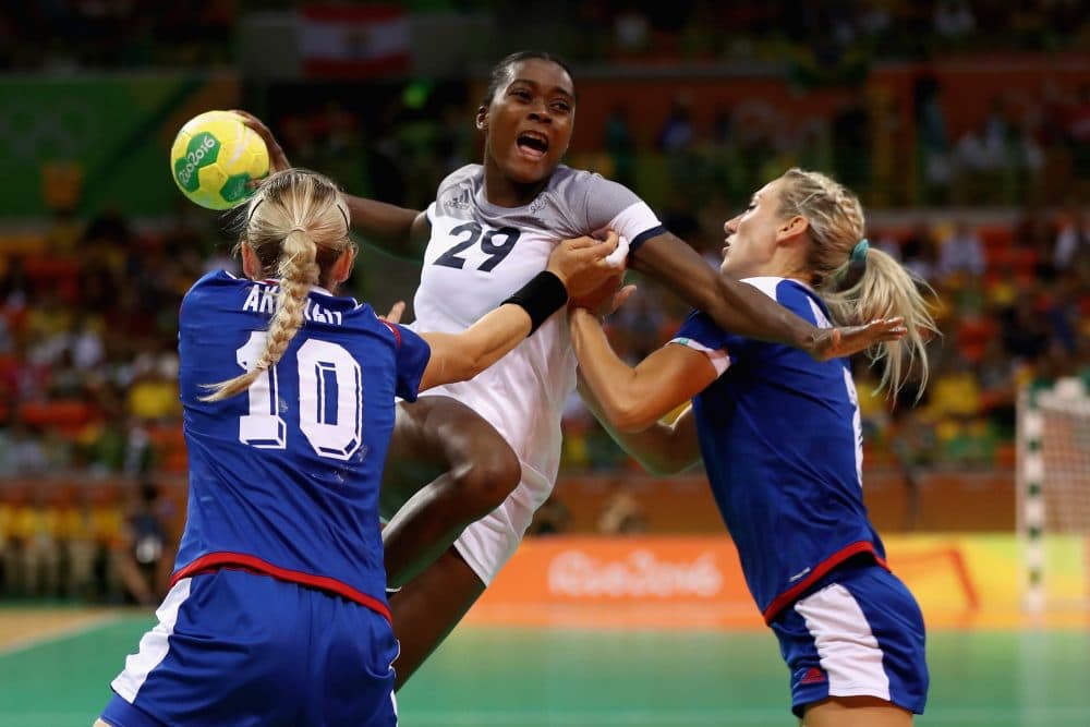 Russia (blue) topped France in the women's handball final. (Elsa/Getty Images)