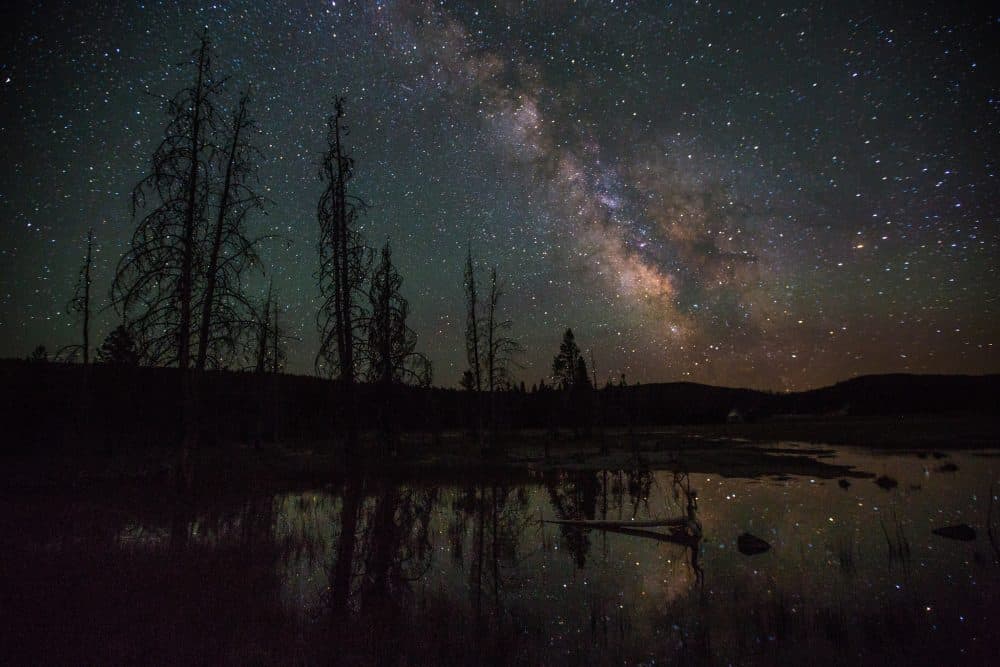 The Milky Way over Firehole Lake Drive. (Neal Herbert/National Park Service via Flickr)