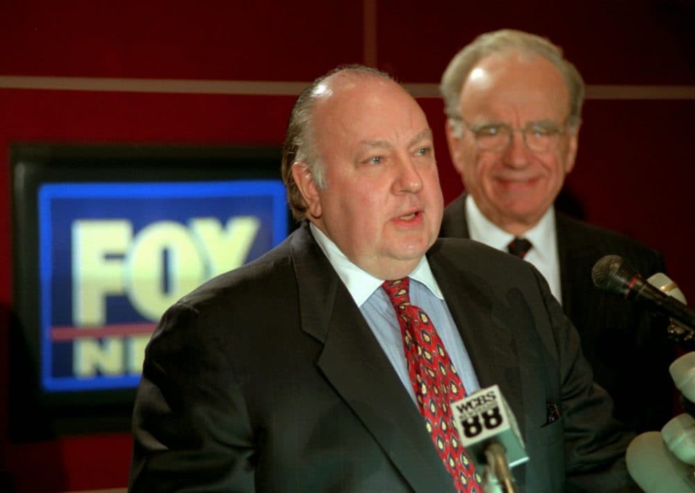 In this 1996 file photo, Roger Ailes, speaks after being named chairman of Fox as Rupert Murdoch looks on. He left the network after a sexual harassment lawsuit. (Richard Drew/AP)