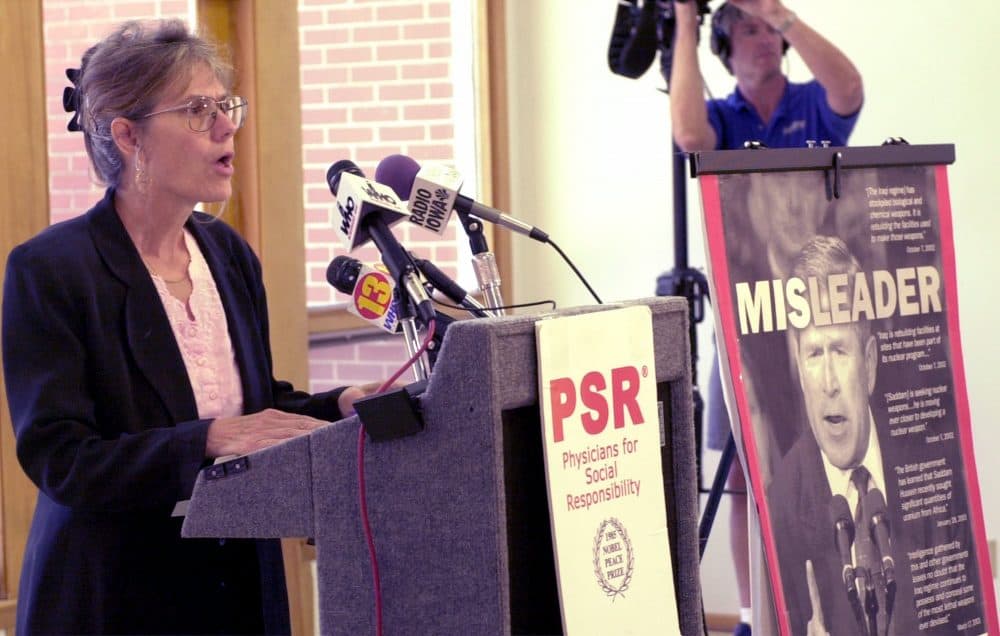 Maureen McCue, co-coordinator of the Iowa chapter of Physicians for Social Responsibility, speaks during a 2003 news conference in Des Moines, saying that President Bush hadn't been honest with the American people in his justification for attacking Iraq. (Steve Pope/AP)