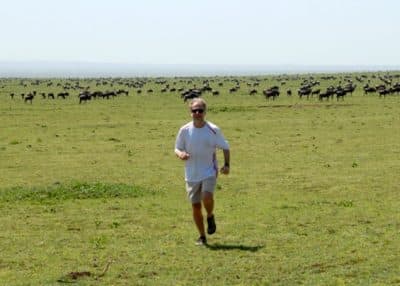Dr. Daniel Lieberman runs in the Serengeti. (Courtesy of A. Reich)