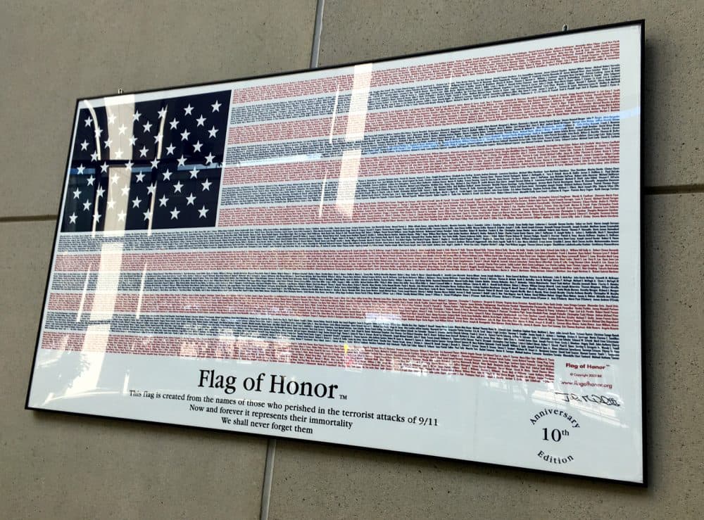 A flag names each of the lives lost during the 9/11 attacks. (Daniel Guzman/WBUR)