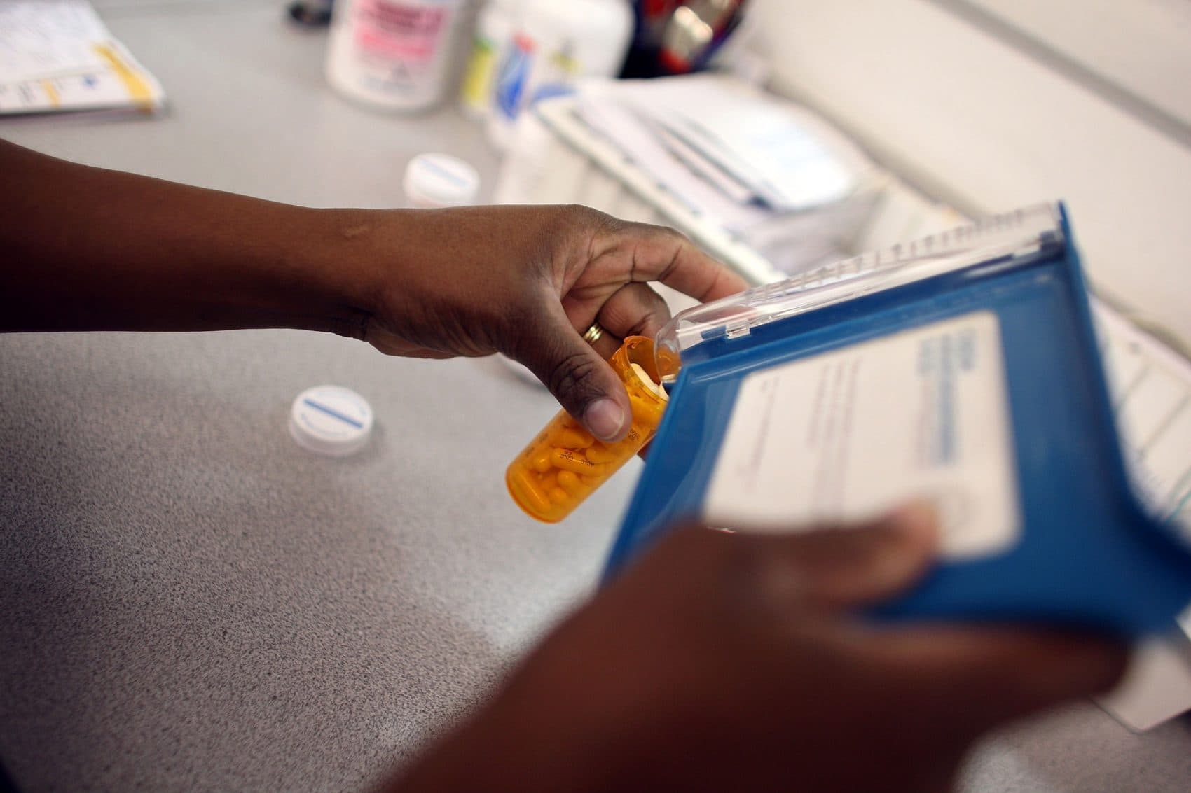 A Publix Supermarket pharmacy technician counts out a prescription of antibiotic pills on Aug. 7, 2007 in Miami. (Joe Raedle/Getty Images)