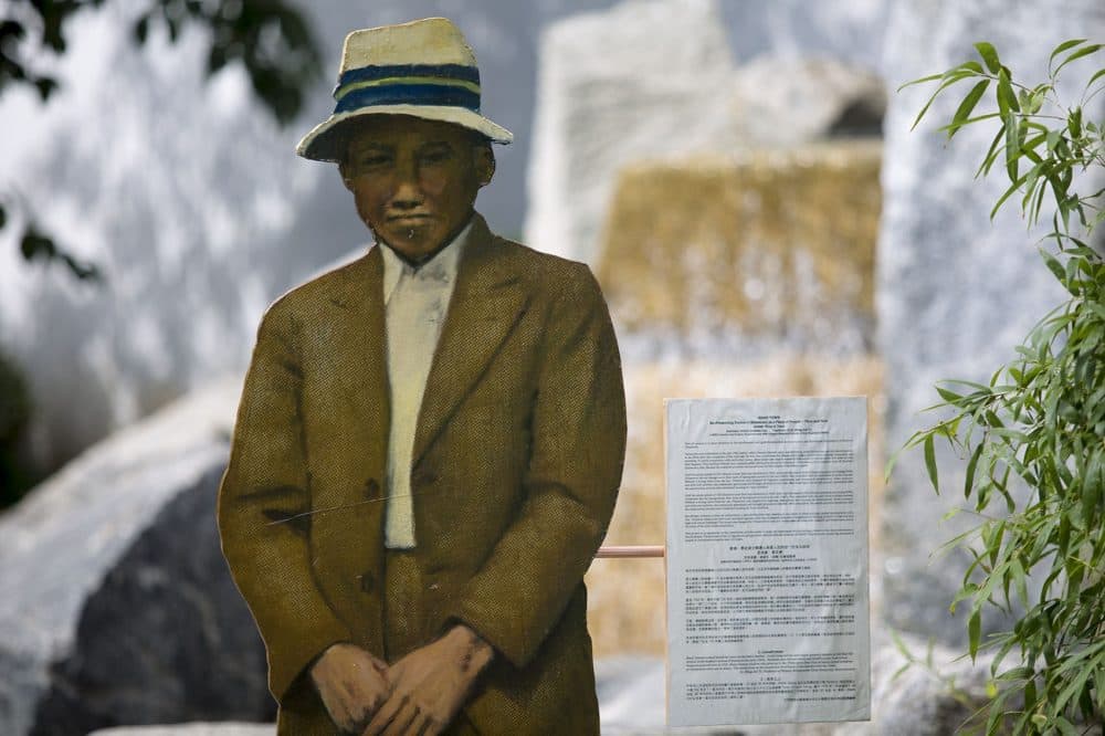 The &quot;Laundryman&quot; is one of the few photographs of people at work Tsen was able to find. (Jesse Costa/WBUR)