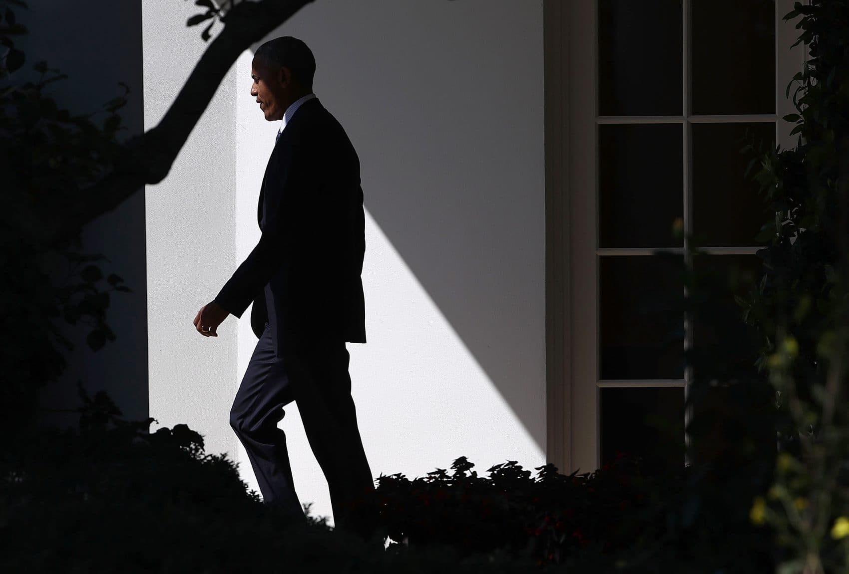 President Barack Obama departs the Oval Office of the White House on Sept. 13, 2016 in Washington, D.C. (Win McNamee/Getty Images)