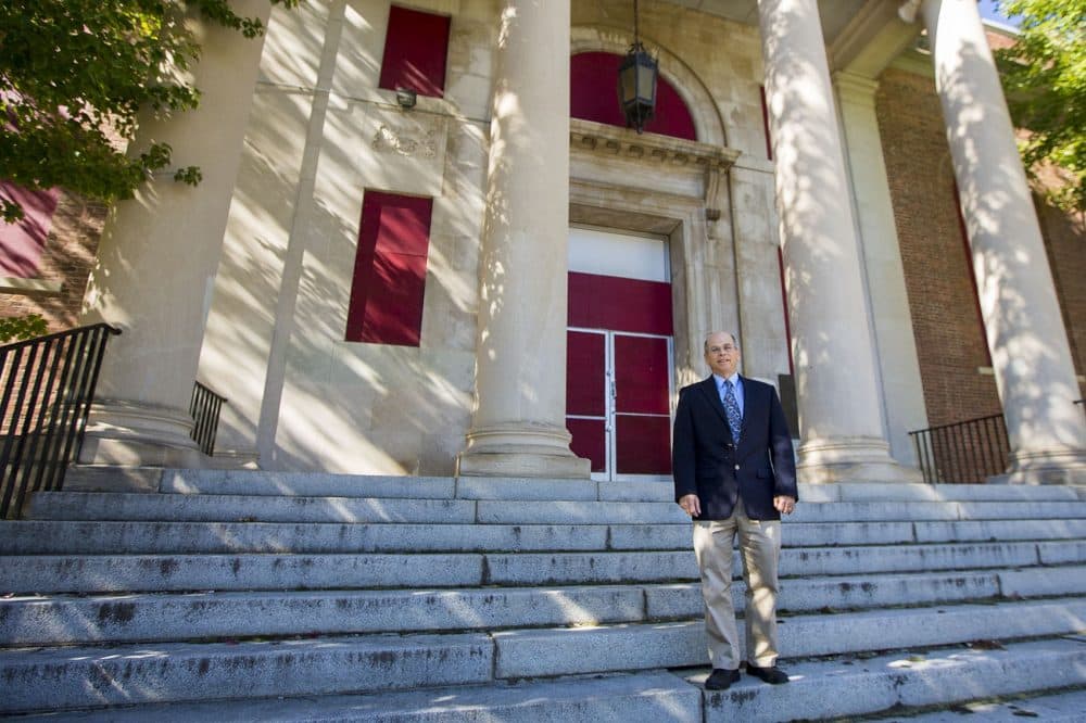 Marc Dohan executive director NewVue Communities standing in front of the vacant B. F. Brown School which NewVue plans to renovate into artist apartments. (Jesse Costa/WBUR)