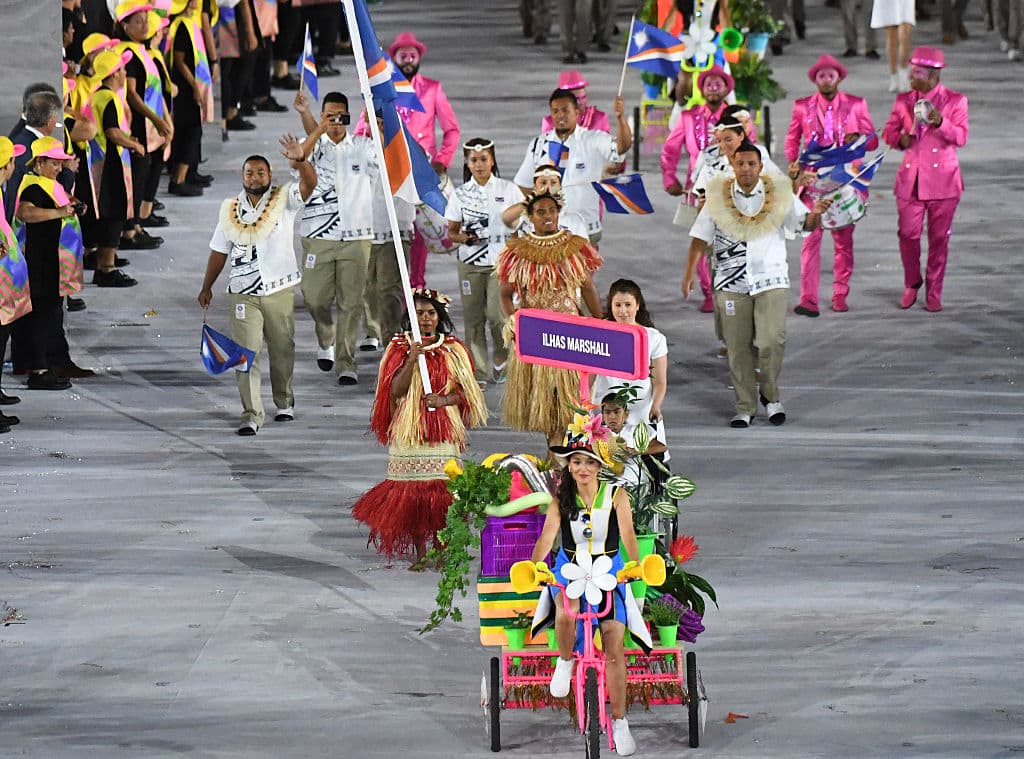 Richson Simeon, center, has only competed in three track meets. One of them was the Olympics. (Pedro Ugarte/AFP/Getty Images)