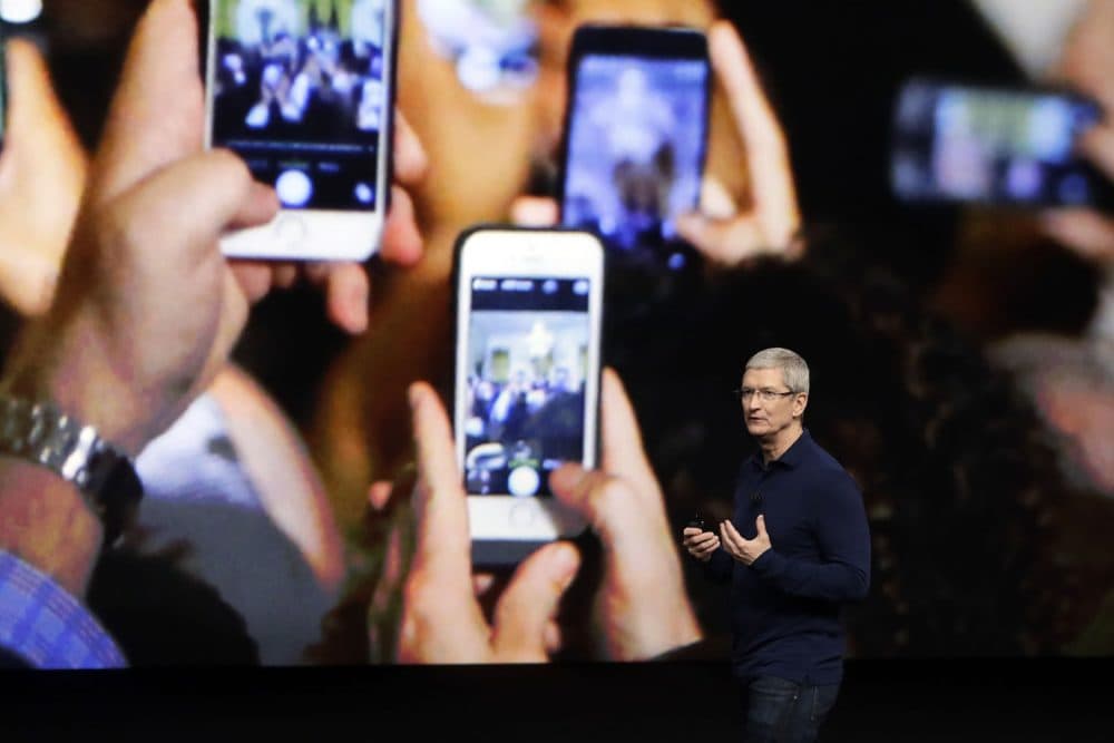 Apple CEO Tim Cook announces the new iPhone 7 during an event to announce new products Wednesday, Sept. 7, 2016, in San Francisco. (AP Photo/Marcio Jose Sanchez)