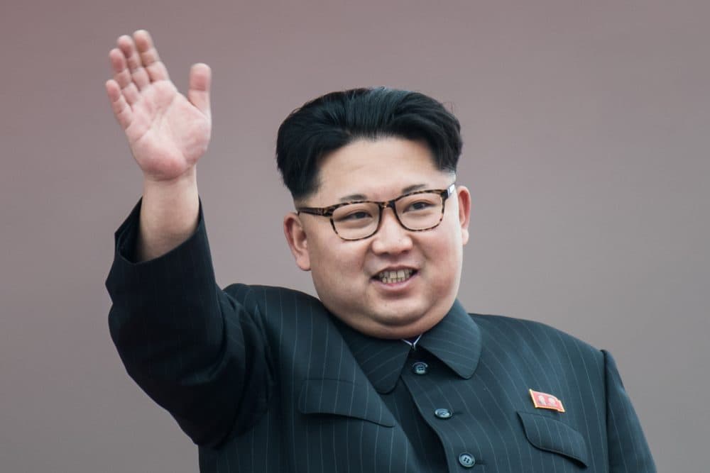 North Korean leader Kim Jong-Un waves from a balcony of the Grand People's Study House following a mass parade marking the end of the seventh Workers Party Congress in Kim Il-Sung Square in Pyongyang on May 10, 2016. (Ed Jones/AFP/Getty Images)