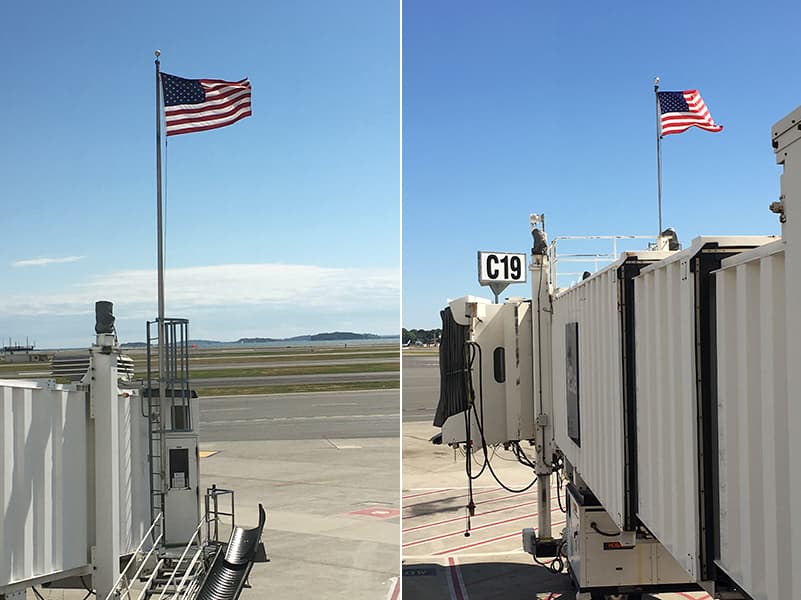 American flags at gates B32, left, and C19 (Daniel Guzman/WBUR)