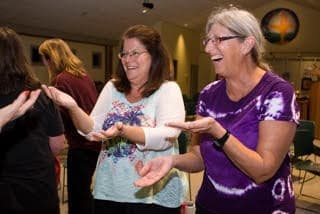 In today's episode we talk with Bill and Linda Hamaker, who lead laughing yoga classes like the one pictured here. (Courtesy Bill and Linda Hamaker)