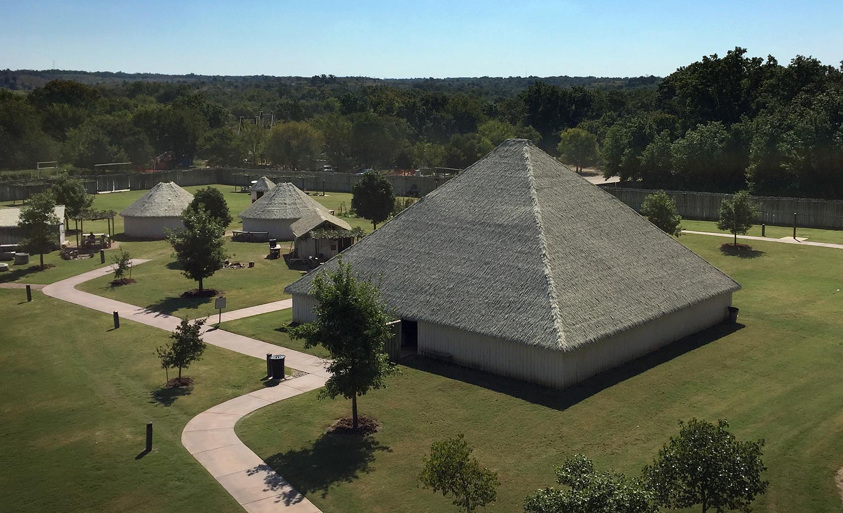 A view overlooking the Chikasha Inchokka' Traditional Village at the Chickasaw Cultural Center in Sulphur, Okla. (Karyn Miller-Medzon/Here &amp; Now)