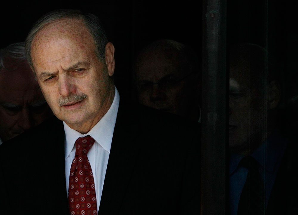 Former Speaker Salvatore DiMasi leaves federal courthouse in Boston after being convicted on corruption charges. (AP)