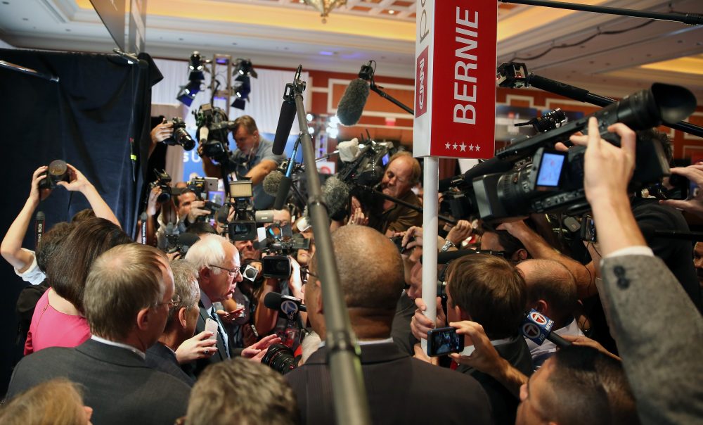 Sen. Bernie Sanders (I-VT) (L) is interviewed in the spin room after he took part in a presidential debate sponsored by CNN and Facebook at Wynn Las Vegas on Oct. 13, 2015 in Las Vegas. (Joe Raedle/Getty Images)