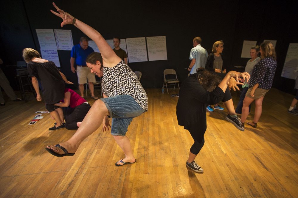 Teachers perform their visual interpretations. (Jesse Costa/WBUR)