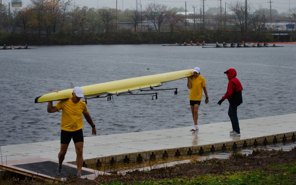 Dale Howard and Bob Blew bring in their boat after racing in the Grand-Master men's 60+ competition. When asked how they did Blew says, &quot;Haven't checked yet, but we finished. We at least got T-shirts.&quot; (Elizabeth Gillis/WBUR)