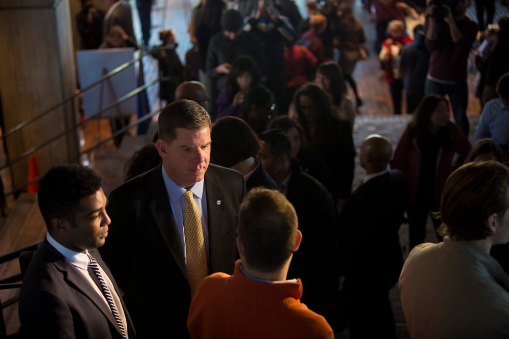 Boston Mayor Marty Walsh stands in line for the first day of early voting at City Hall. (Jesse Costa/WBUR)